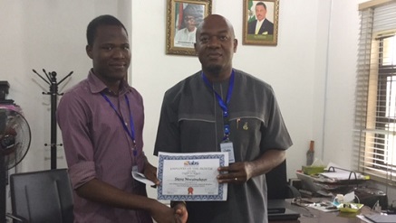 L-r: Mr. Steve Nwainokpor of the Anambra Broadcasting Service (ABS) Digital Team receiving his the Employee of the Month award from Mr Uche Nworah, managing director and CEO of ABS in Awka recently.